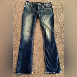 Express brand barely boot Stella low rise medium dark denim. Size 6 regular.